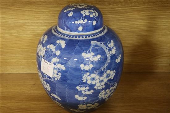 A 19th century Chinese blue and white prunus jar and cover and two other items